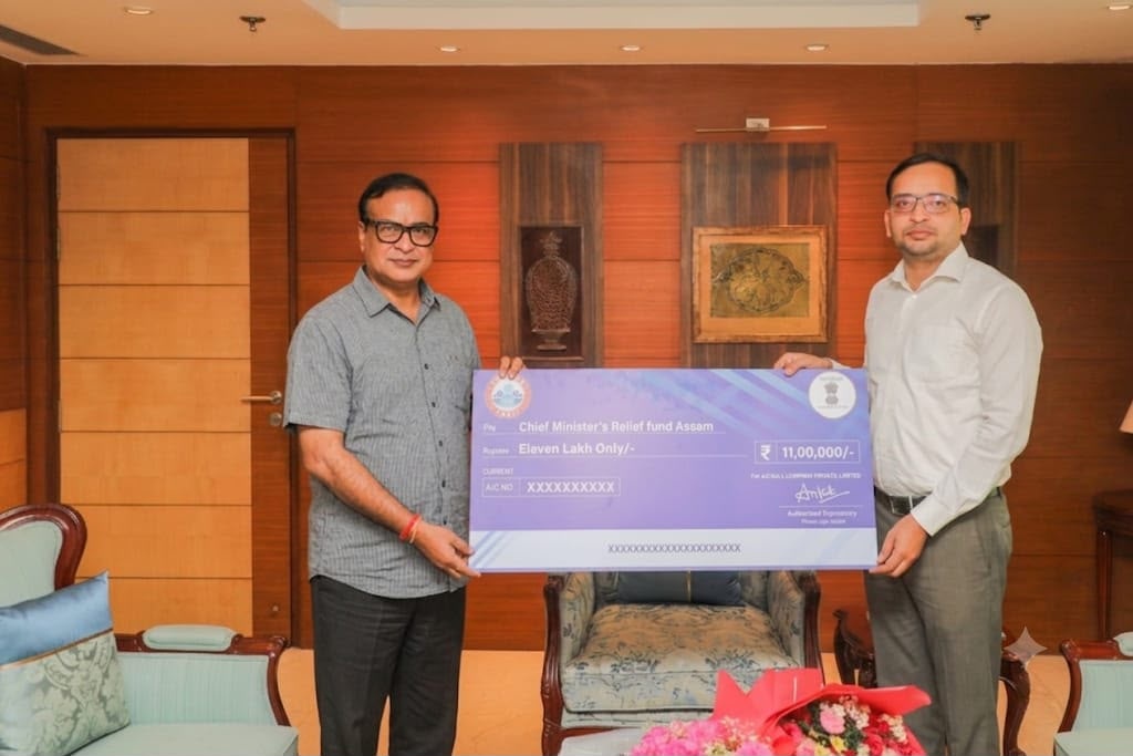 Ankit Bhati Sir and Rojgar With Ankit community handing over Assam flood relief contribution at Assam House, New Delhi